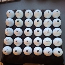 Bridgestone Tour b 330 and tour bxs x 30 golf balls  grade 1 great condition.