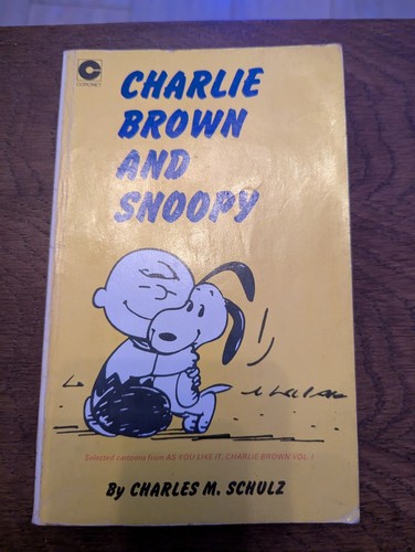 Charlie brown and snoopy by - and,