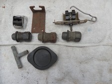 JAGUAR  XJS PARTS NEW  HEADLAMP TRIMMER O.S. WHEEL NUTS ETC PLEASE SEE PICS   .