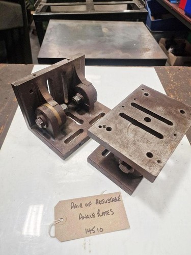Pair adjustable angle - of,