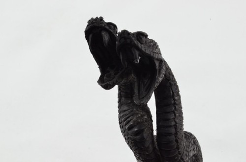 Hand carved snakes - carved,