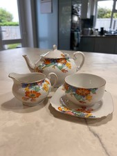 China tea set, made in Czechoslovakia, showing signs of age, but very charming