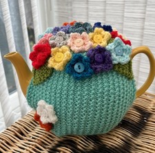 Hand Knitted Aqua Colour Tea Cosy With Flowers. Fits Medium Size Teapot