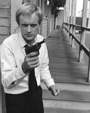 David McCallum pointing gun