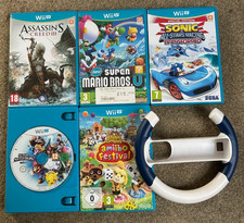 Wii U Games Bundle: Super Mario, Smash Bros Assassins Creed Sonic Racing + Wheel