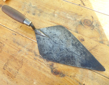 VINTAGE  BRICKLAYERS  TROWEL, Brick trowel. Large / wide. 11" x 5 1/2". Capped.
