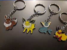 Pokémon Go Enamel keyrings Bag Tags Charms Eevee, Fareon, Jolteon & Vaporeon