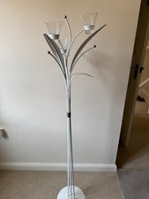 Floor standing metal candle