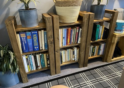 Wooden library shelves - library,