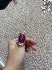 Large silver ring with magenta stone