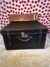 Vintage canvas and leather trimmed hat box storage box.