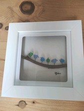 Sea glass birds on a branch