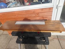 SOLID MAHOGANY FIREPLACE HEARTH WITH A STAINLESS STEEL PAD FOR THE FIRE