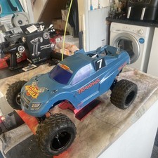 Traxxas Rustler Fitted With .15 Buggy  Runs Well new transmitter included clean