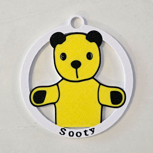 Sooty bear round plastic - sooty,