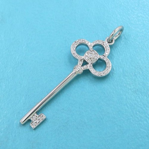 Tiffany crown key - &,
