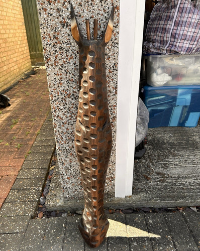 Hand carved brown wooden - carved,