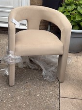 Beige Coloured Curved Chair