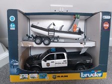 Bruder RAM 2500 police pickup with trailer and boat model vehicle toy