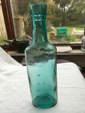 Early crude old green glass