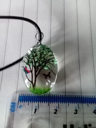 Oval shaped pendant with - pendant, dried