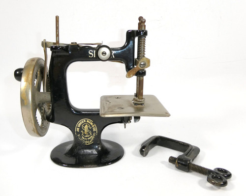 Singer sewing machine circa - singer,