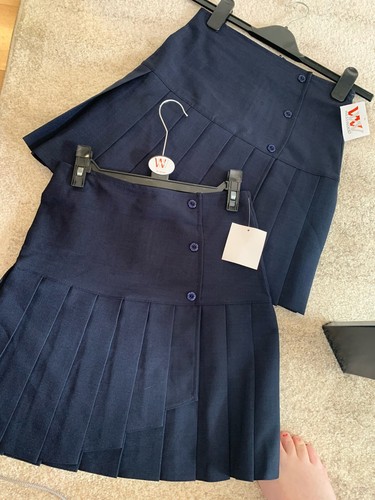 Age navy school skirts - 13-14,