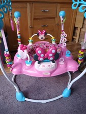 Bright Starts Disney Minnie Mouse Jumperoo with lights and sounds.