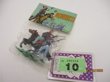 Plastic cowboy figures in