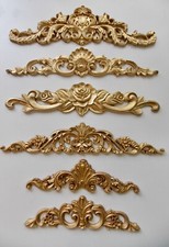SIX ORNATE FURNITURE PEDIMENTS