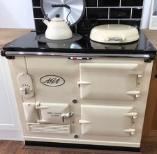 AGA COOKER TRADITIONAL 2 OVEN 13 AMP ELECTRIC IN CREAM. INCLUDING A FREE PLINTH