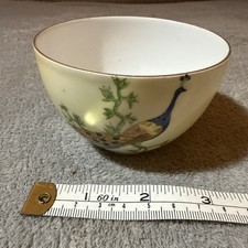 A hand-painted ceramic sugar