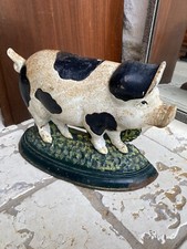 Vintage hand painted cast iron pig door stop