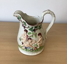 Vintage Majolica Style Pottery JUG Textured Relief Cherubs Design