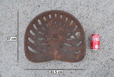 old vintage iron tractor seat