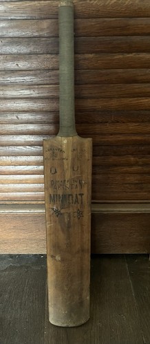 Small old cricket bat - old,
