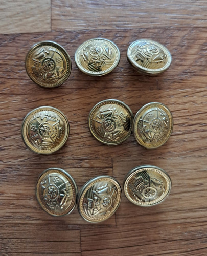 Metallic buttons possibly - buttons, (possibly