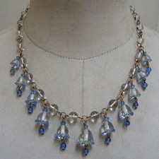 Vintage pools of light druks, with a fringe of antique flower beads