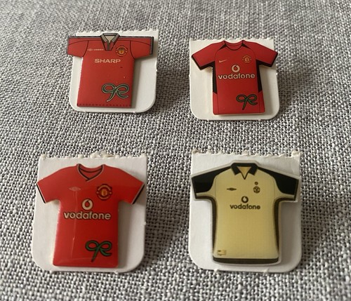 Four man utd football strip - football,