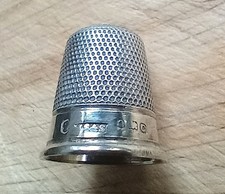 Solid silver James Swann of Birmingham thimble. Either 1902 or 1927.