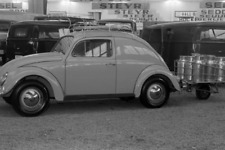 A monowheel trailer fitted to a Volkswagen beetle Motor Show 1960 4x6 Photo