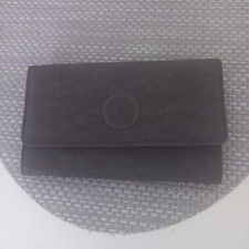 kipling lange brown purse never used