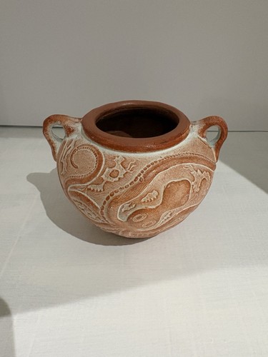 Round terracotta urn feat twin - urn,