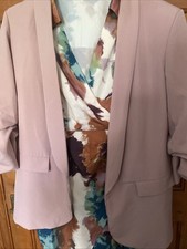Pale Pink Jacket With Crossover Attached Dress With A Block Colour.