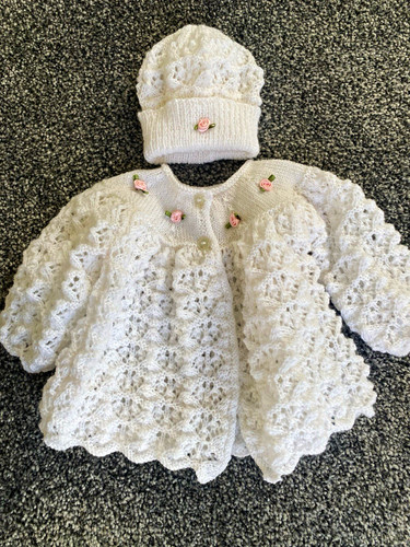 Hand knitted baby girl