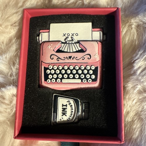 Pink typewriter and black ink - black,