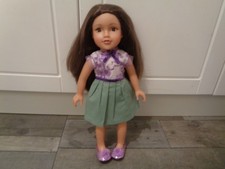 design a friend brunette doll wearing her gorgeous dress and shoes