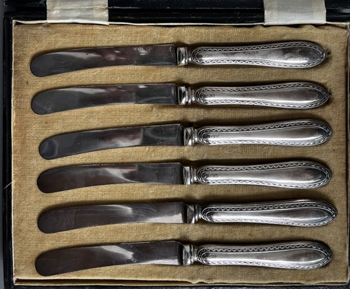 Cased set silver butter - of,