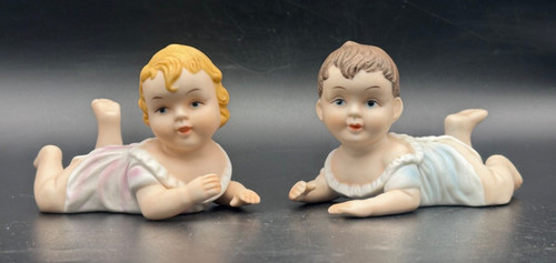 Vintage pair bisque piano - of,