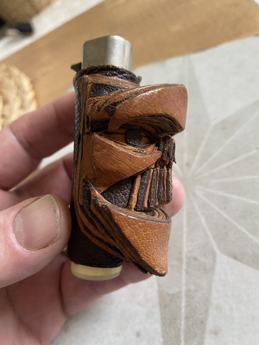 Unusual leather face lighter - unusual,
